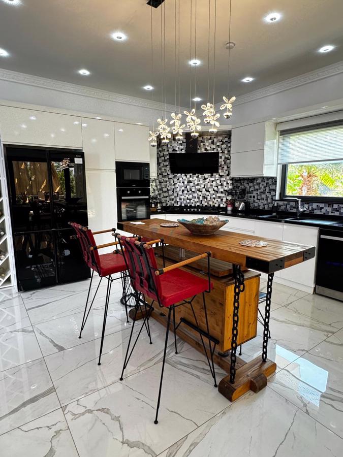 RE/MAX PUPA'DAN KALKAN'DA SATILIK LÜKS DENİZ MANZARALI VİLLA - Görsel 19