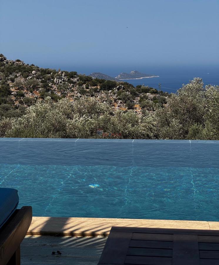 RE/MAX PUPA'DAN KALKAN'DA SATILIK LÜKS DENİZ MANZARALI VİLLA - Görsel 9